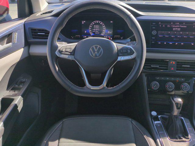 used 2023 Volkswagen Taos car, priced at $22,670