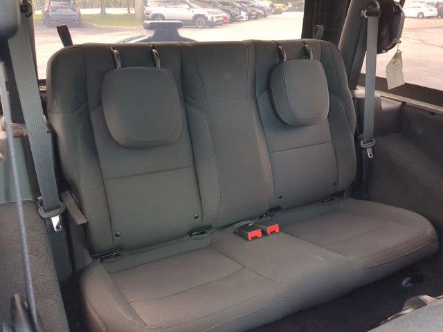 used 2023 Jeep Wrangler car, priced at $28,990