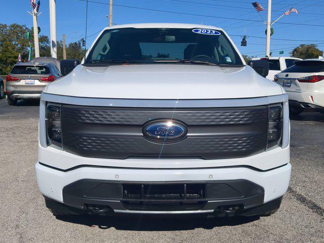 used 2023 Ford F-150 Lightning car, priced at $35,990