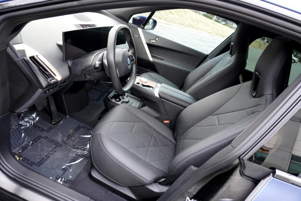 used 2023 BMW iX car, priced at $54,995