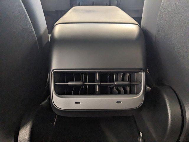 used 2025 Tesla Model Y car, priced at $38,863