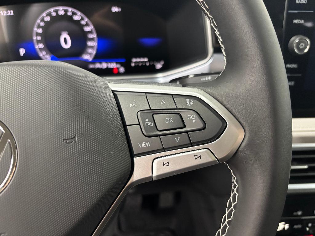 new 2025 Volkswagen Taos car, priced at $27,996
