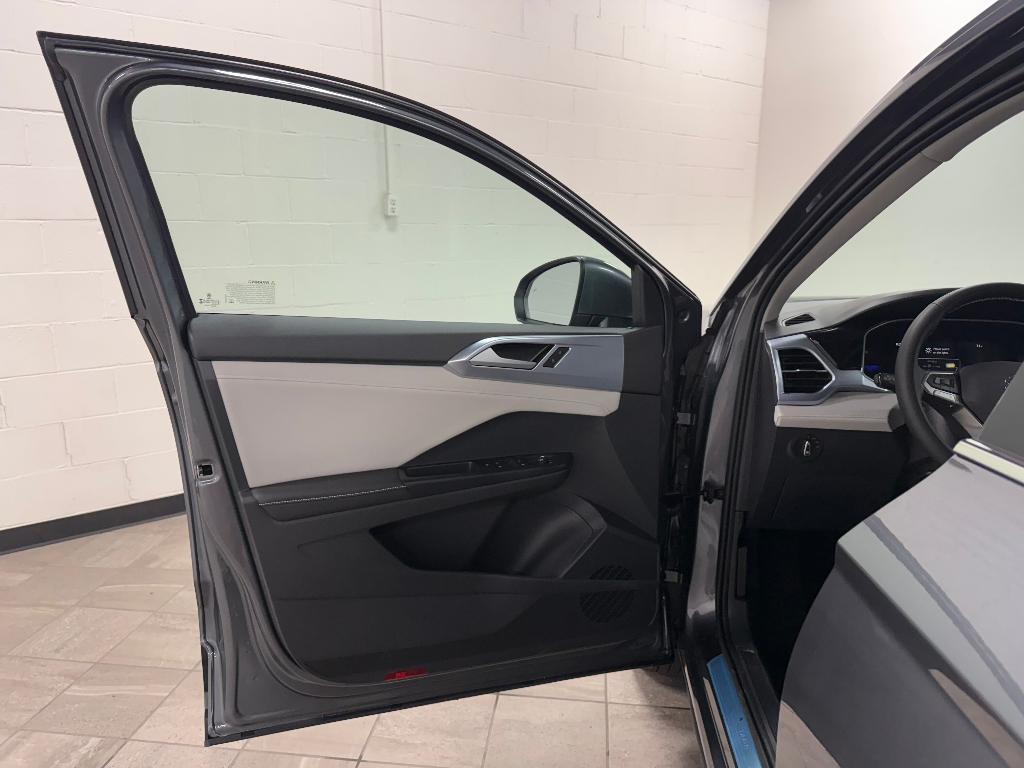new 2025 Volkswagen Taos car, priced at $27,921