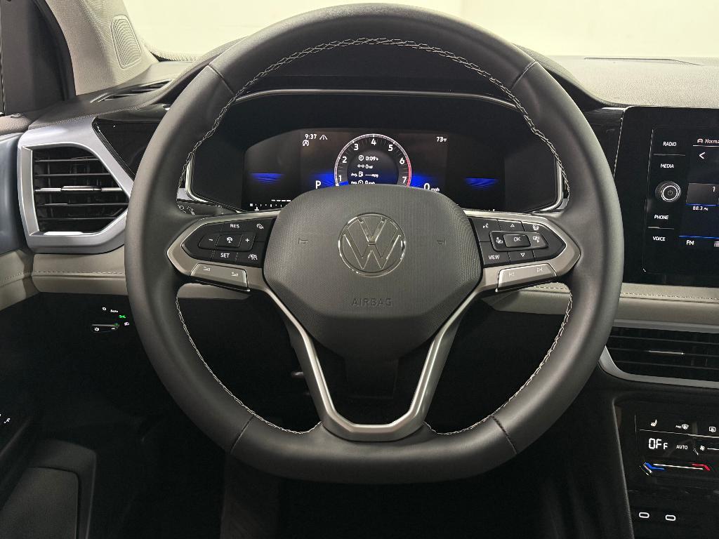 new 2025 Volkswagen Taos car, priced at $27,921