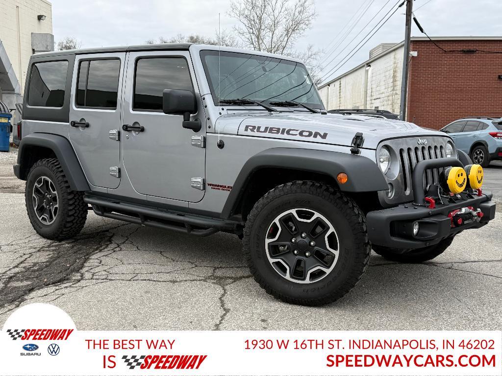 used 2015 Jeep Wrangler Unlimited car, priced at $24,014