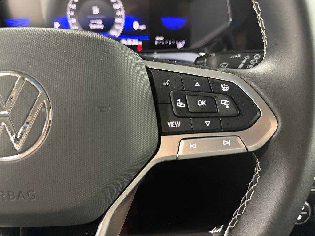 used 2024 Volkswagen Taos car, priced at $26,000