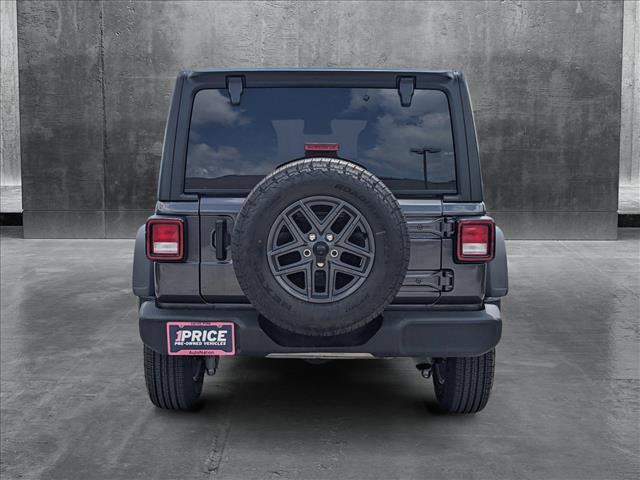 used 2024 Jeep Wrangler car, priced at $43,641