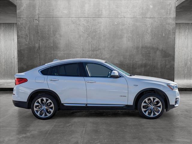 used 2016 BMW X4 car, priced at $16,641