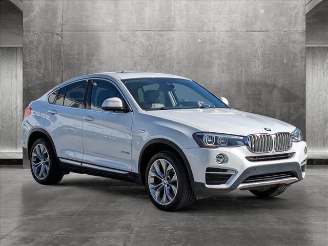 used 2016 BMW X4 car, priced at $16,641