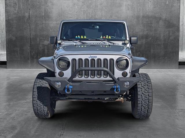 used 2013 Jeep Wrangler Unlimited car, priced at $16,991