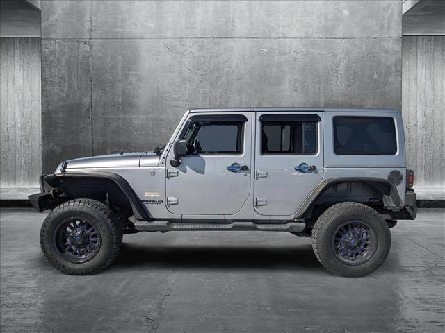 used 2013 Jeep Wrangler Unlimited car, priced at $16,991