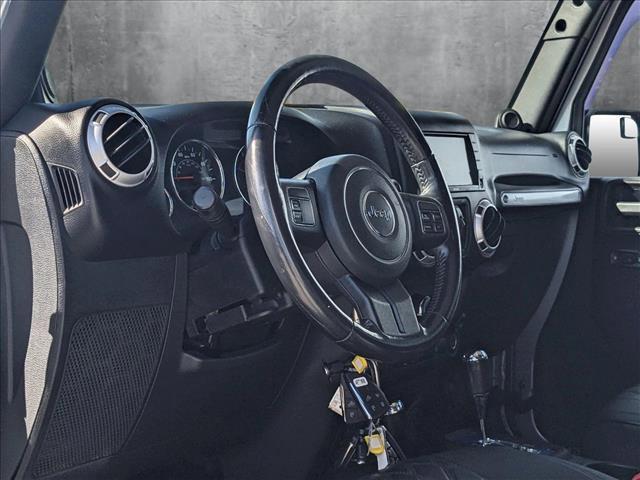 used 2013 Jeep Wrangler Unlimited car, priced at $16,991