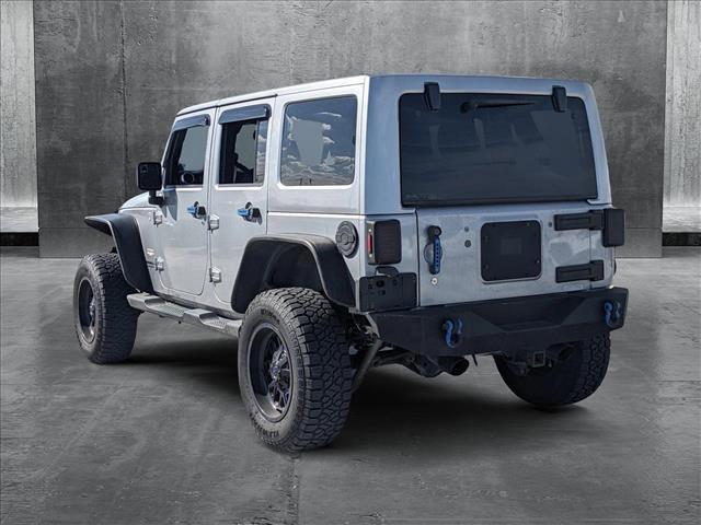 used 2013 Jeep Wrangler Unlimited car, priced at $16,991