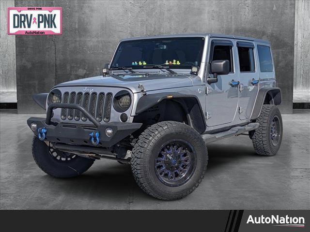 used 2013 Jeep Wrangler Unlimited car, priced at $16,991