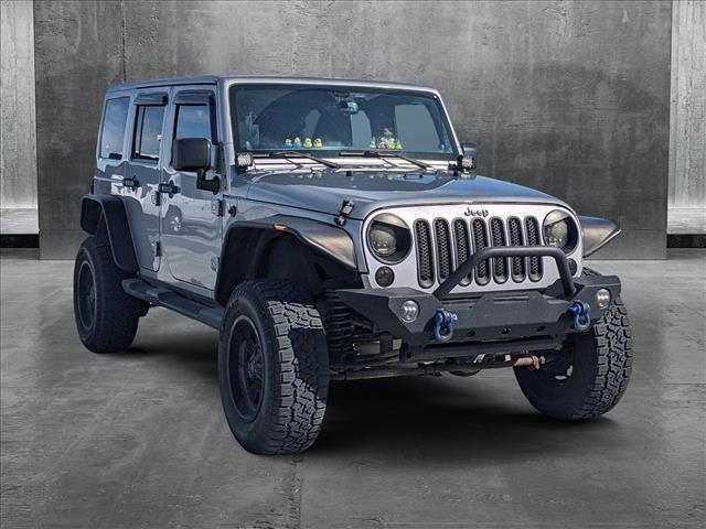 used 2013 Jeep Wrangler Unlimited car, priced at $16,991