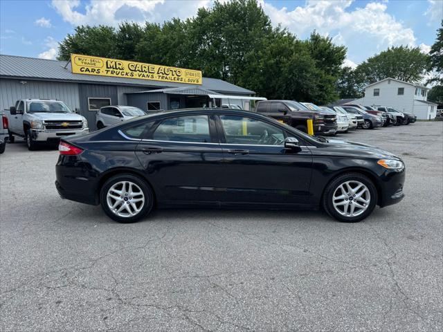 used 2014 Ford Fusion car, priced at $7,990