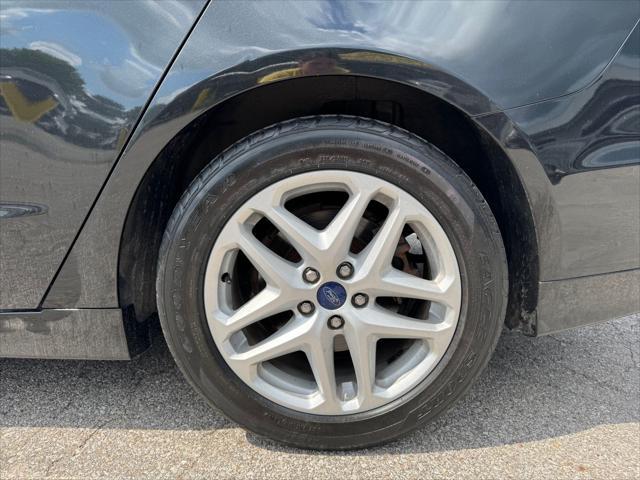used 2014 Ford Fusion car, priced at $7,990