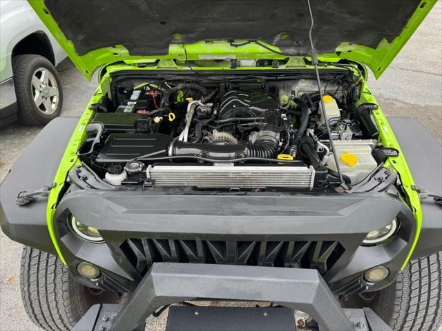 used 2012 Jeep Wrangler Unlimited car, priced at $13,990