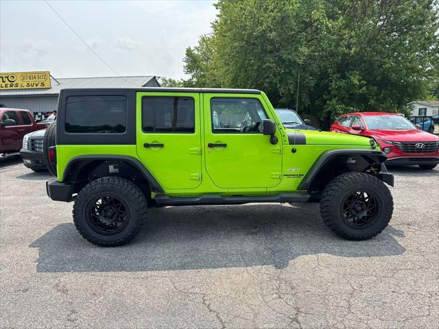 used 2012 Jeep Wrangler Unlimited car, priced at $13,990