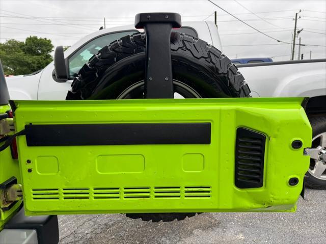 used 2012 Jeep Wrangler Unlimited car, priced at $13,990
