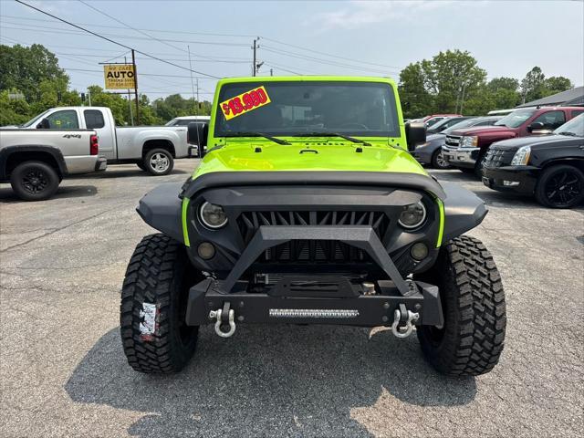 used 2012 Jeep Wrangler Unlimited car, priced at $13,990