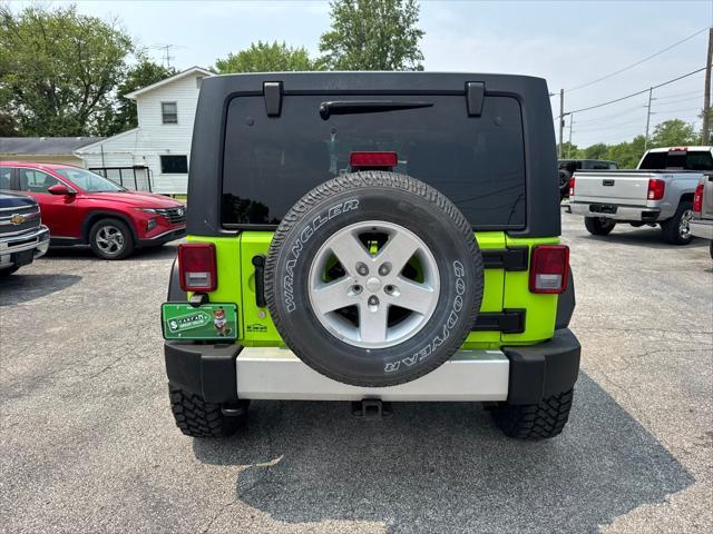 used 2012 Jeep Wrangler Unlimited car, priced at $13,990