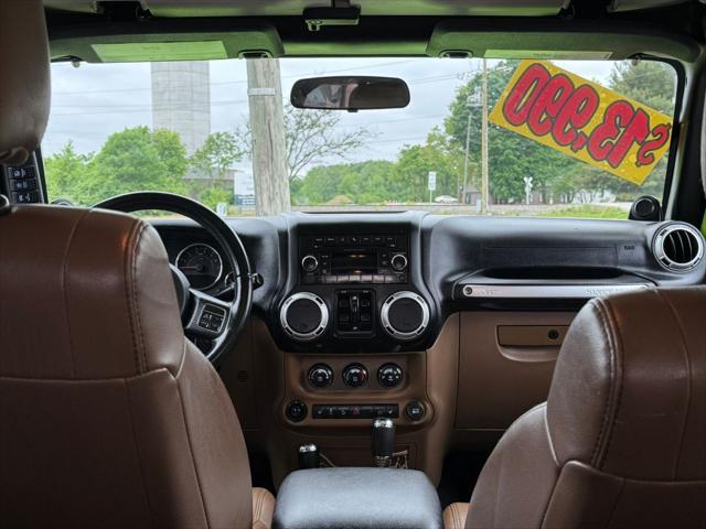 used 2012 Jeep Wrangler Unlimited car, priced at $13,990