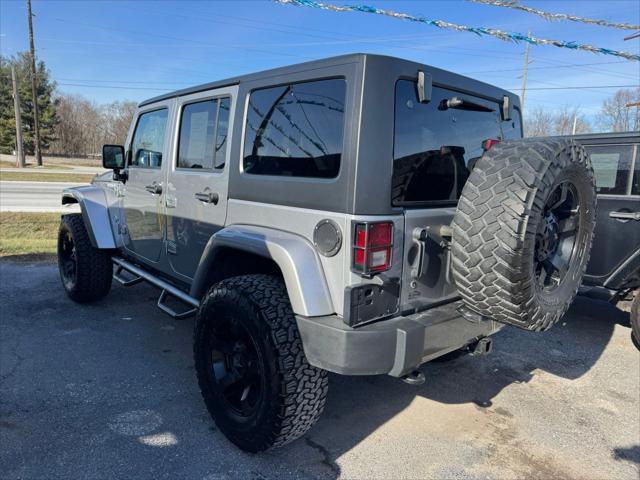 used 2014 Jeep Wrangler Unlimited car, priced at $13,990