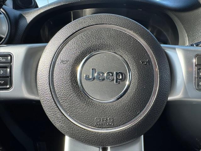 used 2014 Jeep Wrangler Unlimited car, priced at $13,990