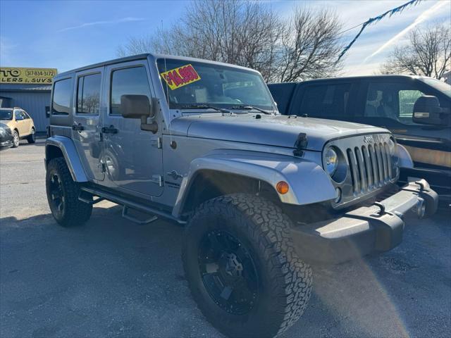 used 2014 Jeep Wrangler Unlimited car, priced at $13,990