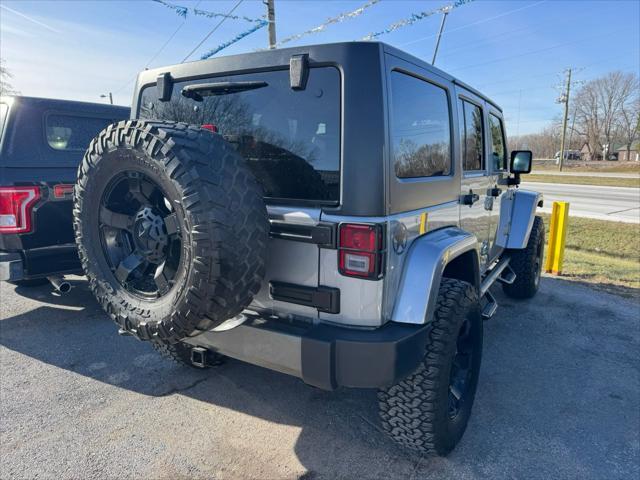 used 2014 Jeep Wrangler Unlimited car, priced at $13,990