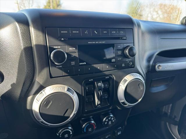 used 2014 Jeep Wrangler Unlimited car, priced at $13,990