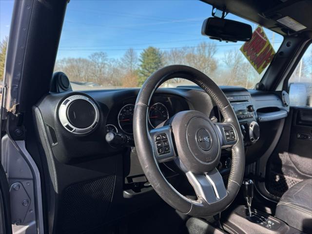 used 2014 Jeep Wrangler Unlimited car, priced at $13,990