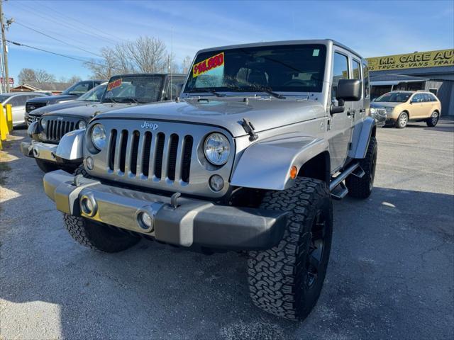 used 2014 Jeep Wrangler Unlimited car, priced at $13,990