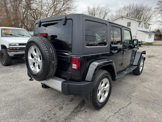 used 2015 Jeep Wrangler Unlimited car, priced at $14,990