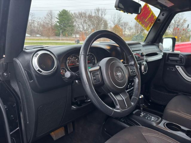 used 2015 Jeep Wrangler Unlimited car, priced at $14,990