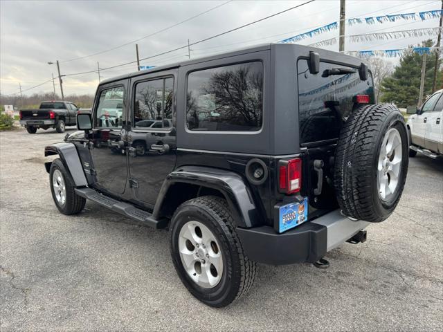 used 2015 Jeep Wrangler Unlimited car, priced at $14,990