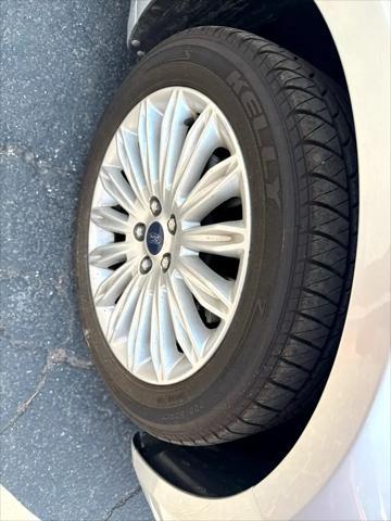 used 2014 Ford Fusion Energi car, priced at $12,995
