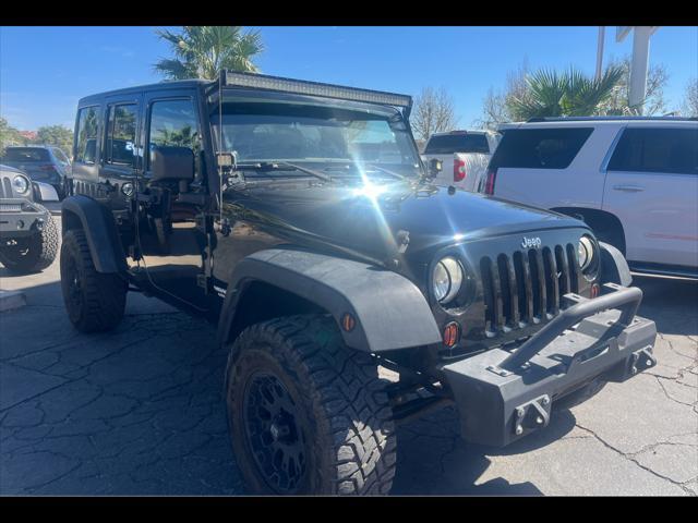 used 2012 Jeep Wrangler Unlimited car, priced at $21,995