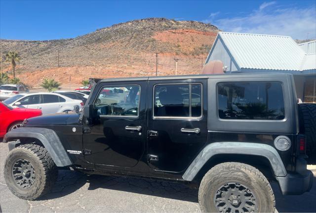 used 2012 Jeep Wrangler Unlimited car, priced at $21,995