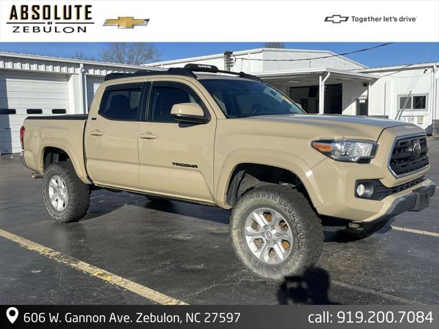 used 2018 Toyota Tacoma car, priced at $25,586