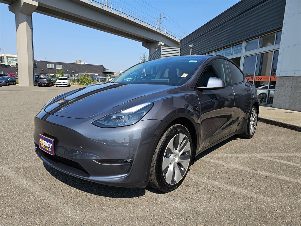 used 2023 Tesla Model Y car, priced at $28,880
