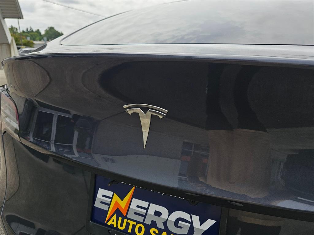 used 2023 Tesla Model Y car, priced at $26,880