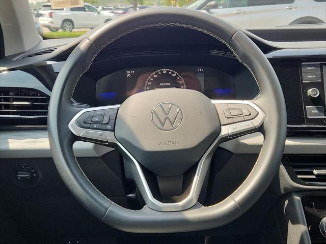 used 2023 Volkswagen Taos car, priced at $17,974