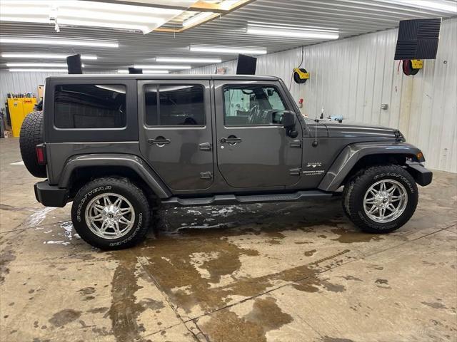 used 2018 Jeep Wrangler JK Unlimited car, priced at $21,997