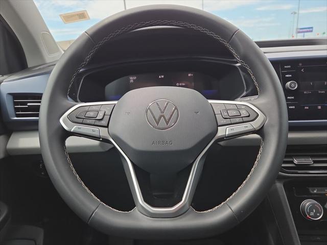 used 2023 Volkswagen Taos car, priced at $21,227