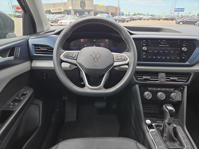 used 2023 Volkswagen Taos car, priced at $21,227