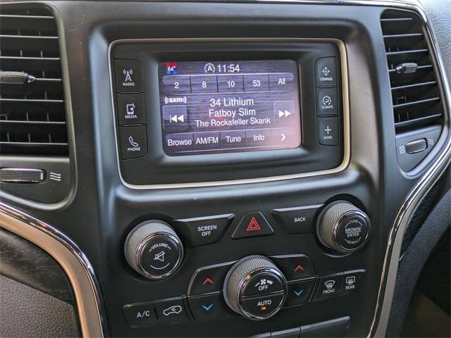 used 2014 Jeep Grand Cherokee car, priced at $13,299
