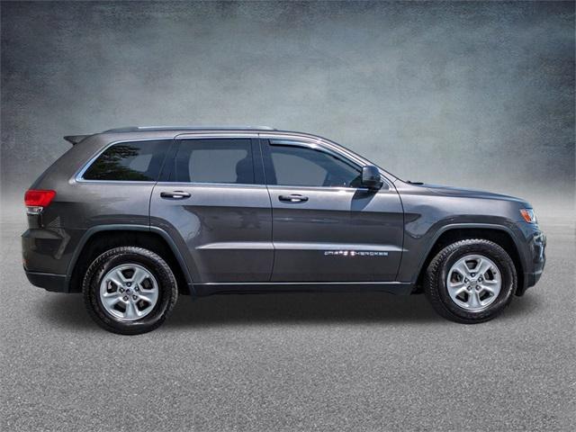 used 2014 Jeep Grand Cherokee car, priced at $13,299