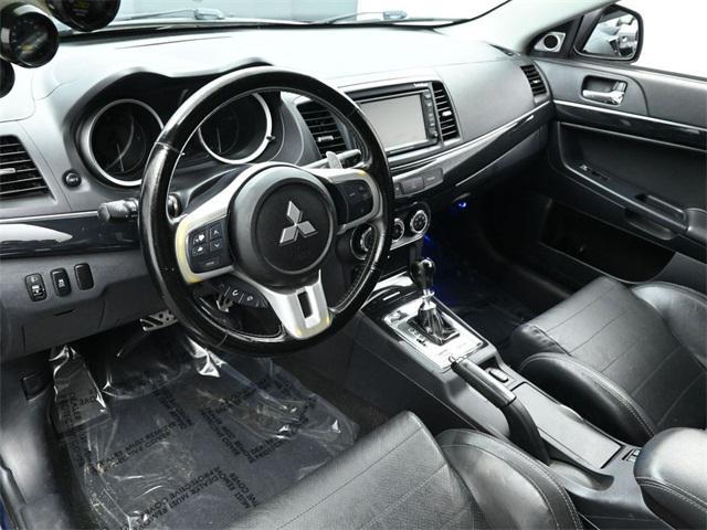used 2013 Mitsubishi Lancer Evolution car, priced at $23,457